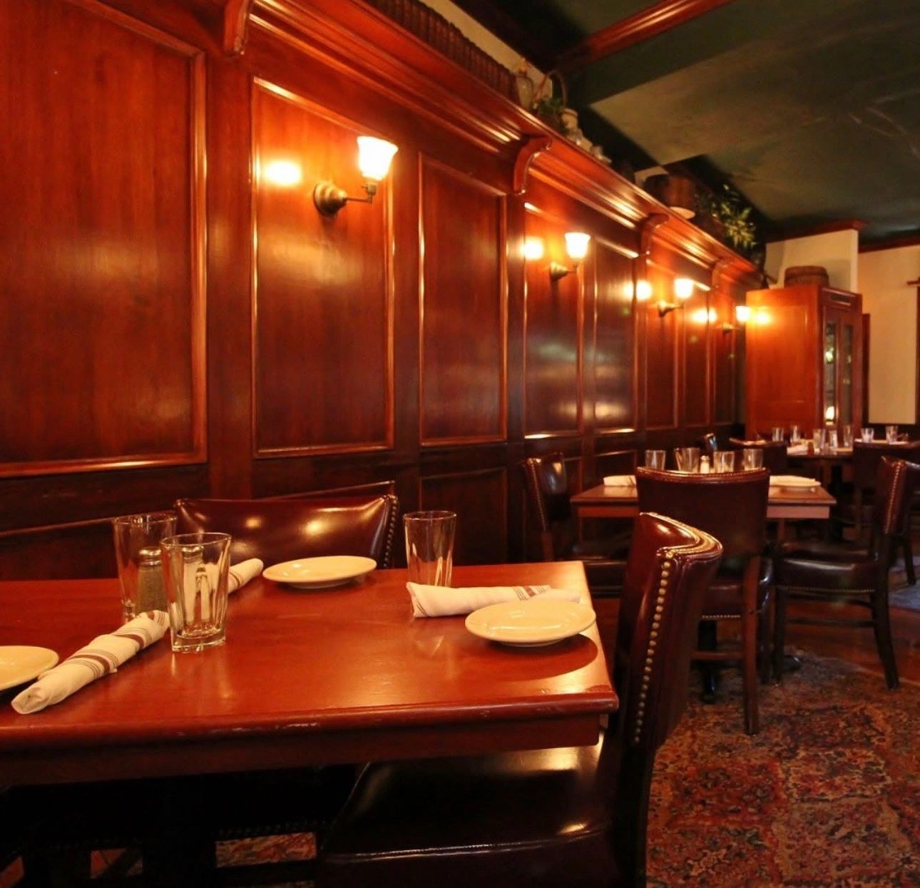 Intimate wood-paneled dining room at Roadhouse